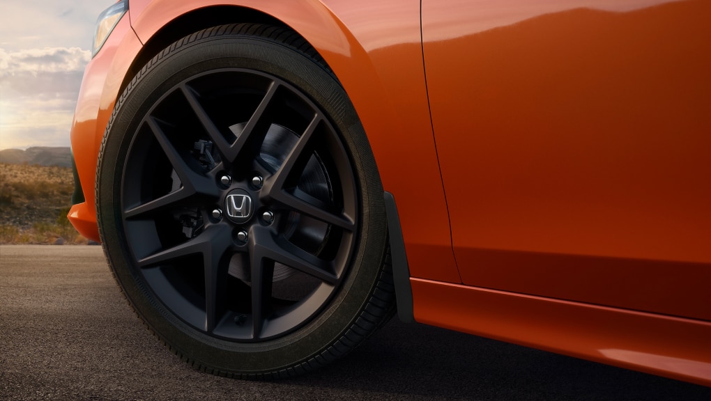 Close up of left front of the Civic showing its 18-inch aluminum-alloy wheels