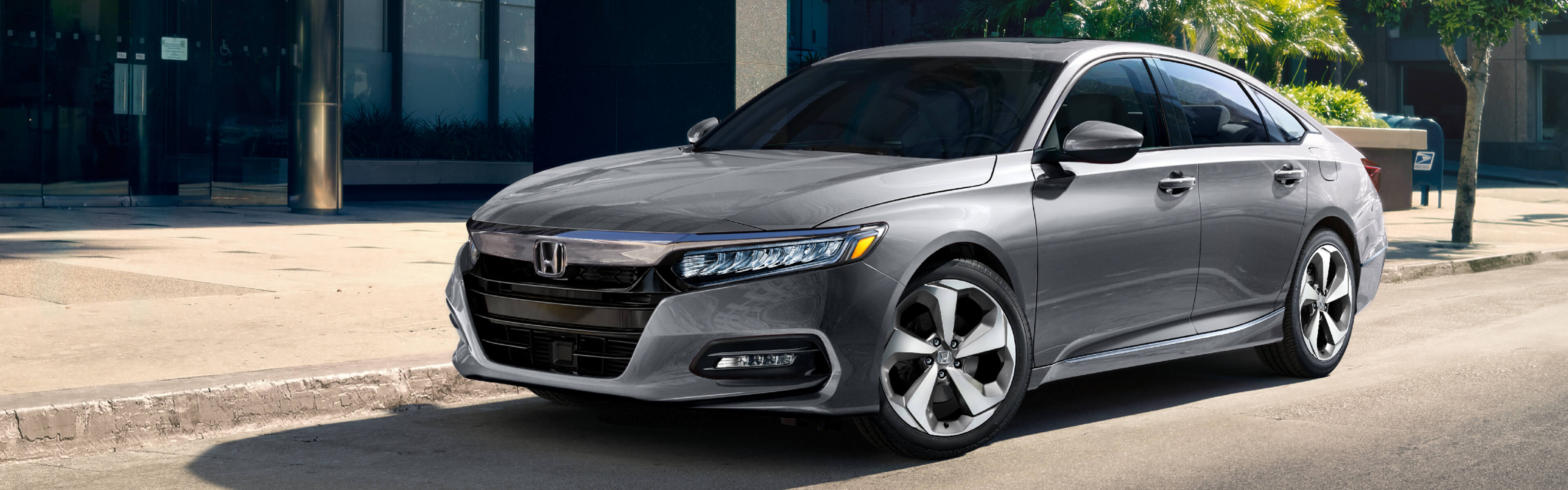 Image of 2020 Honda Accord Sedan on city street.