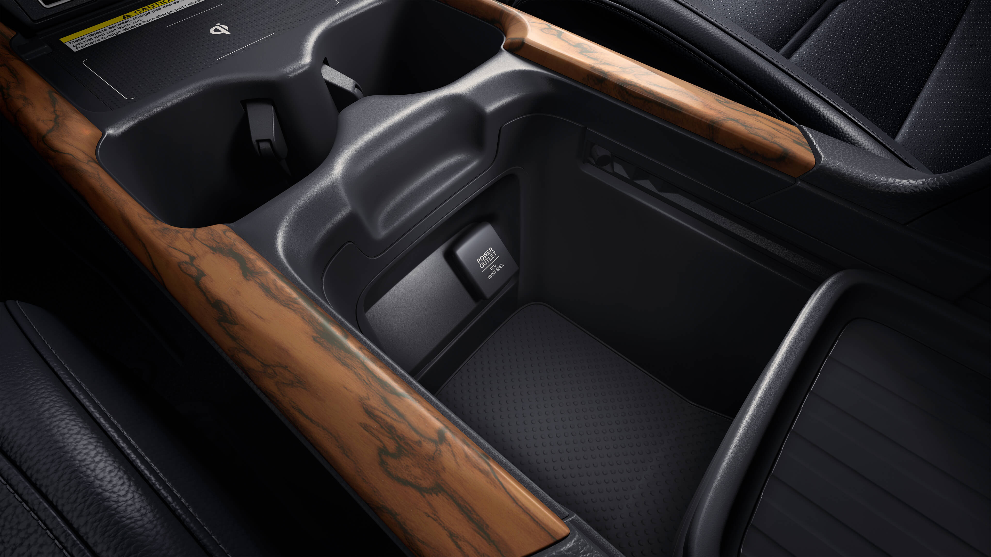 Center console detail in the 2021 Honda CR-V Touring with Black Leather.