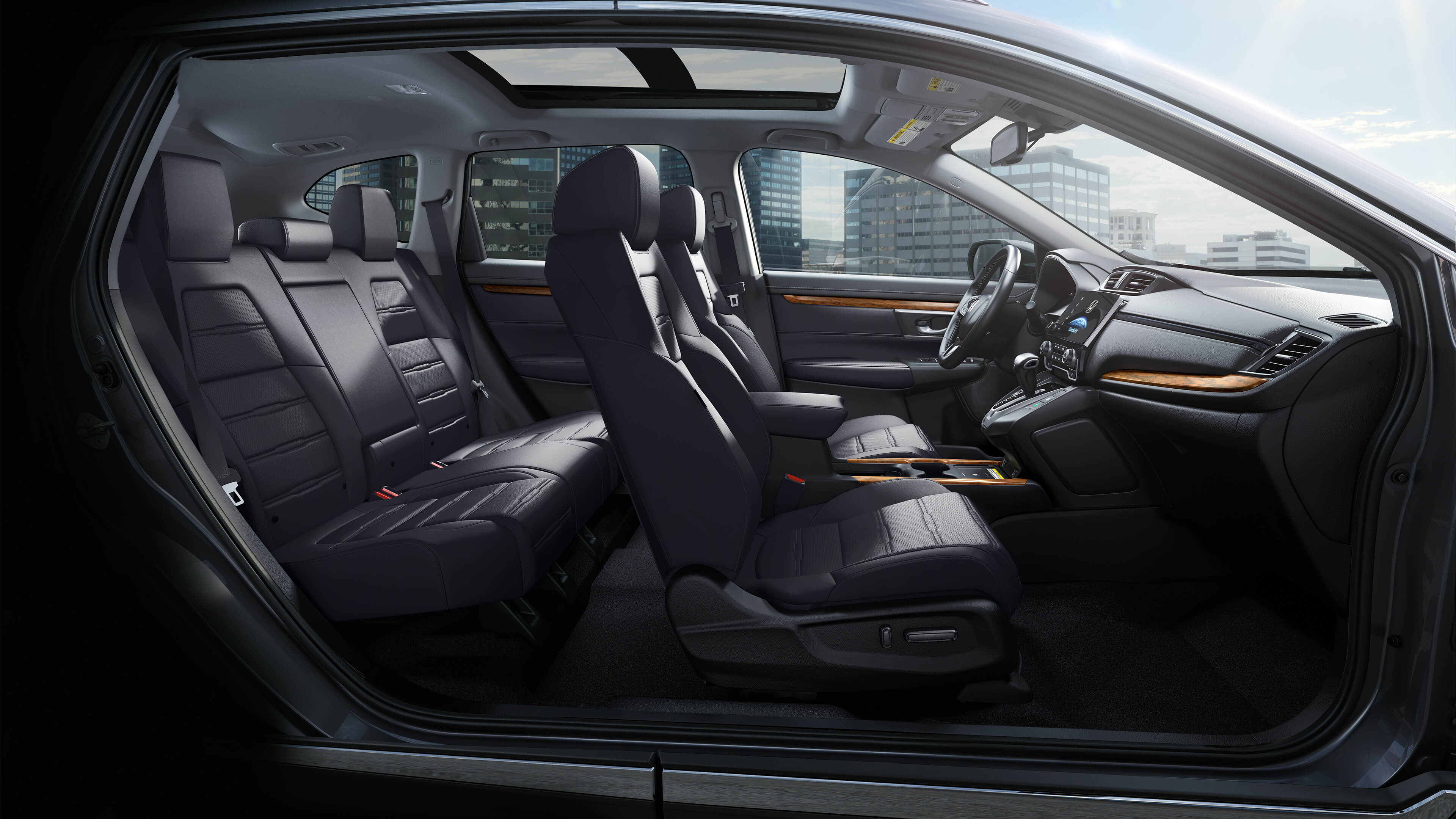 Interior passenger-side view of the 2021 Honda CR-V with leather-trimmed seats.